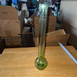 Blenko green glass bud vase with a bulbous base and narrow neck